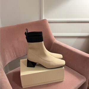 Vivaia Elegant Cream Ankle Boots with Black Trim